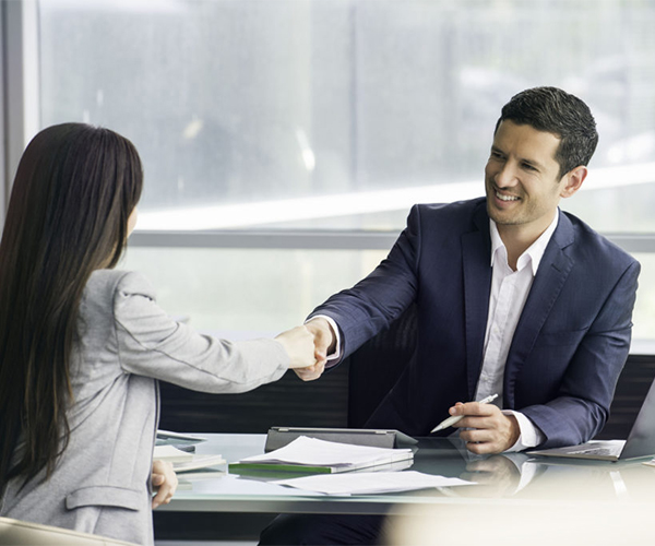 Businessman shaking hands with client